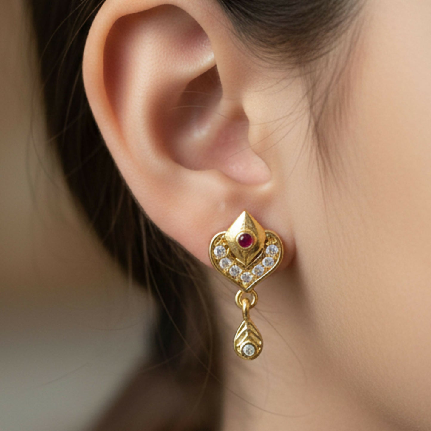 Side view of Royal Gold Heart Drop Earrings with teardrop dangle