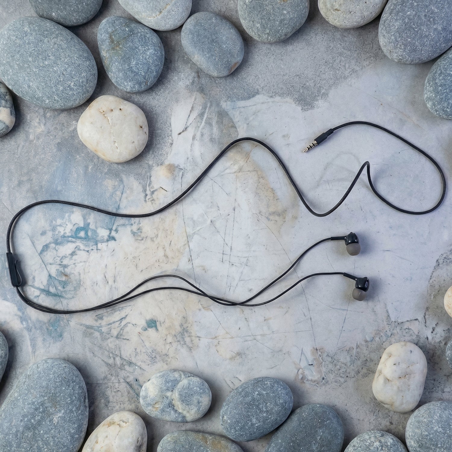 In-ear wired earphones showing earpiece design