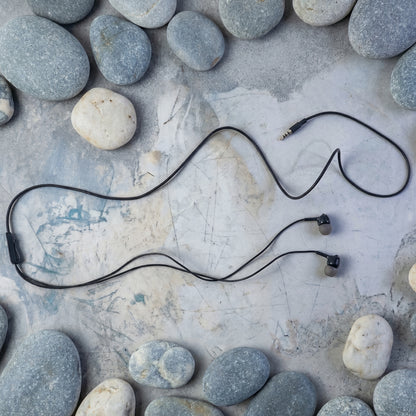 In-ear wired earphones showing earpiece design