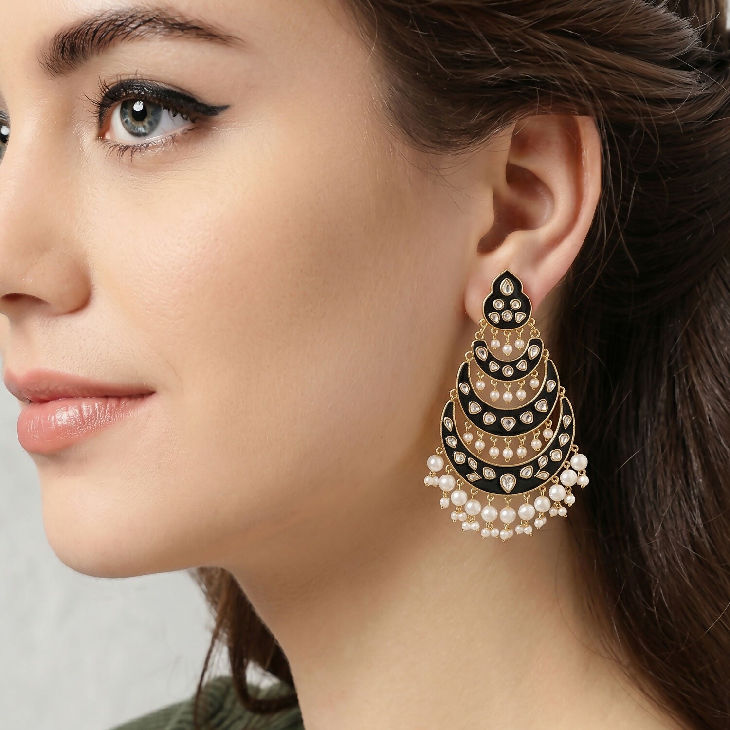 Pink and clear stone accents on antique dome jhumka earrings