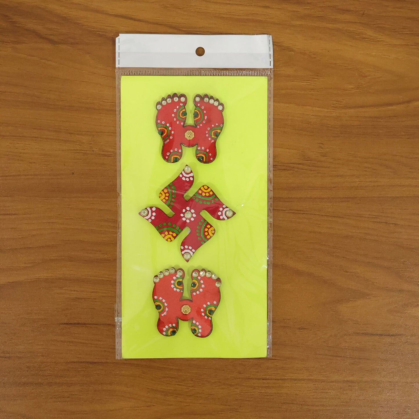 Decorated door with Laxmi Charan and Swastik set