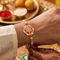 Premium Rakhi For Brother With Artistic Centerpiece And Designer Greeting Card