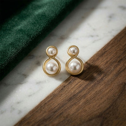 Side view of Korean pearl infinity stud earrings showcasing design