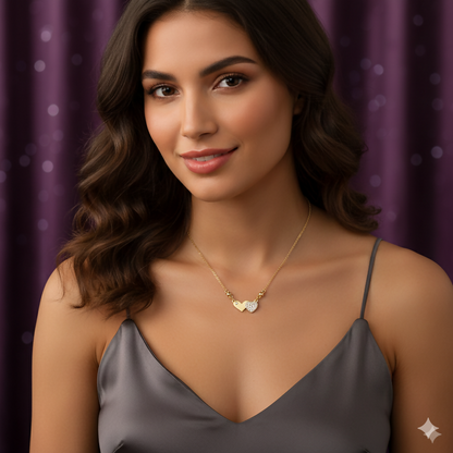 Delicate gold plated chain with double heart pendant highlighting love and unity