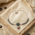 Peacock Stone Silver Charm Bracelet – Elegant Adjustable Accessory