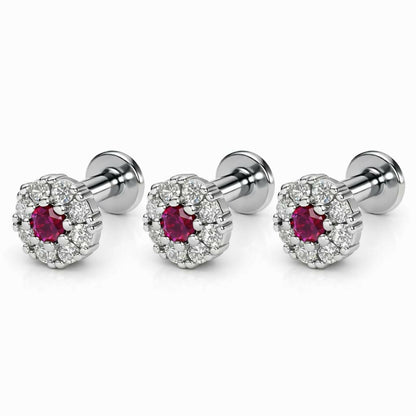 Combo pack of three silver plated ruby flower flat back stud earrings displayed elegantly