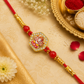 Spiritual Lord Ganesha Figure Designer Rakhi for Brother with Rhinestone Hexagon Border & Red Beads