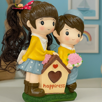 Cute Couple Happiness Piggy Bank – Adorable Boy & Girl Coin Bank Figurine with Realistic Hair and Heart House Design – Premium Resin Money Saver Box for Kids, Home Decoration & Gift Item