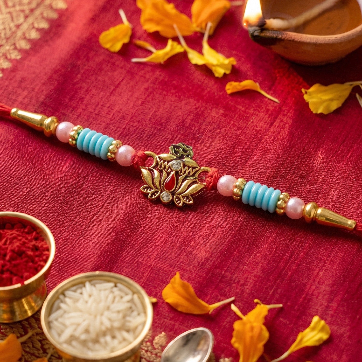 Stylish Rakhi centerpiece design with Ganesha