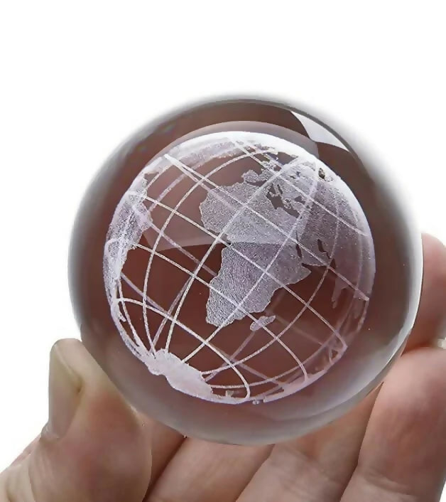 Detailed glowing Earth globe crystal ball LED lamp on desk