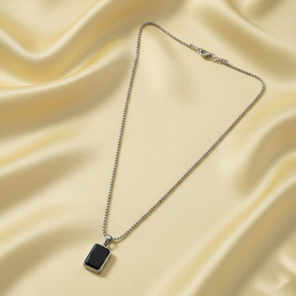 Side view of men's stainless-steel box chain pendant necklace