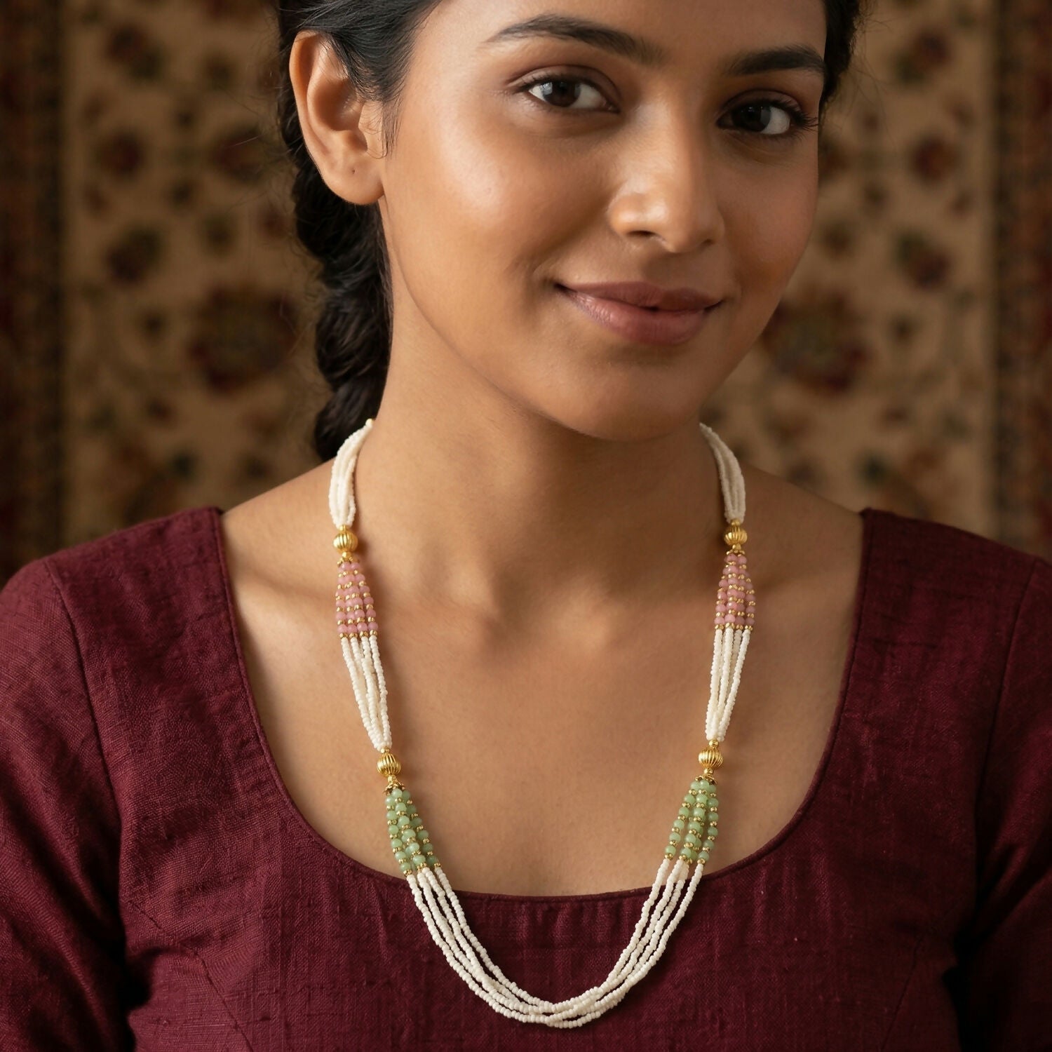 Layered ethnic mala necklace displayed on a white background