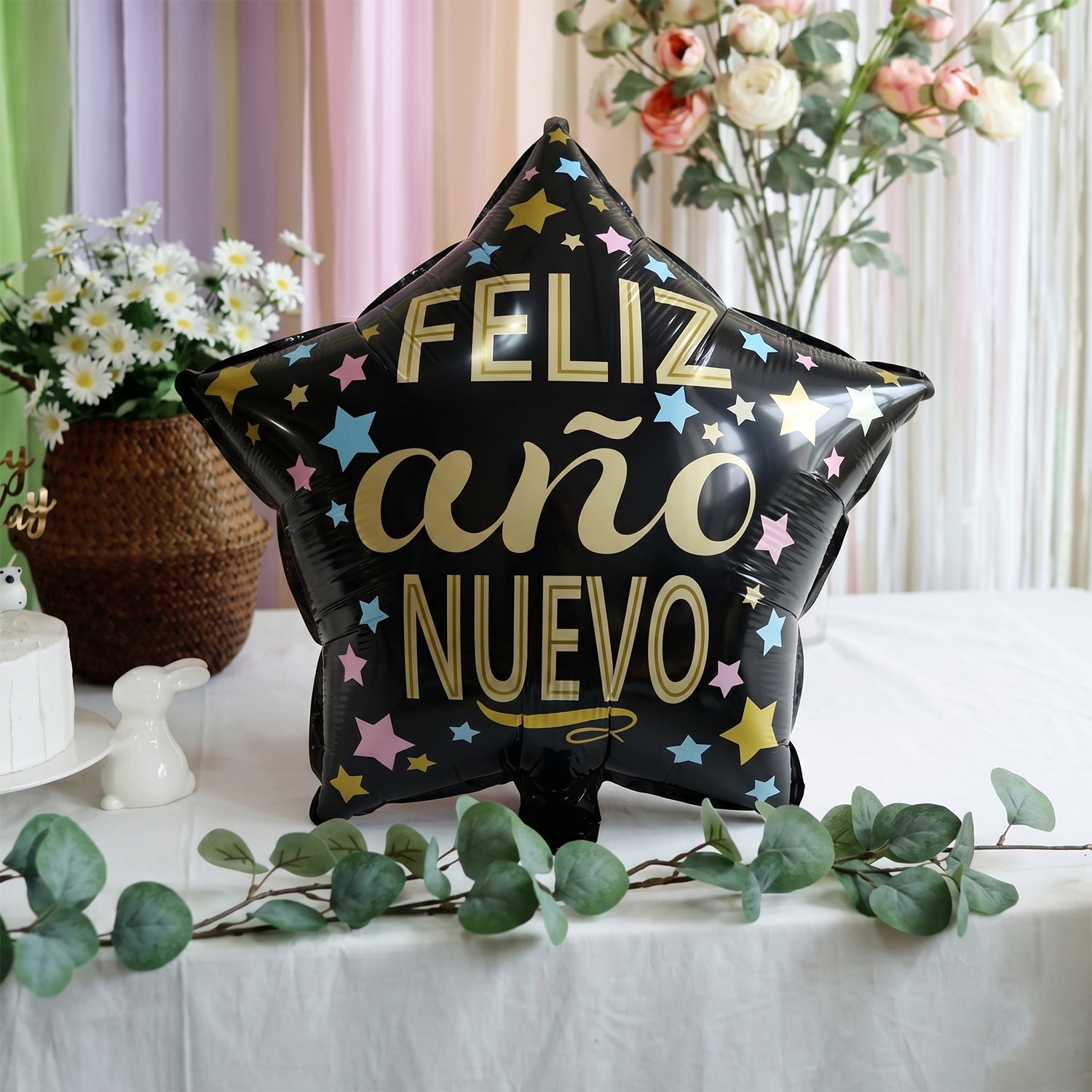 Black Star Feliz Ano Nuevo foil balloon side view