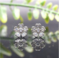 Sterling Silver Flower Stud Earrings – Dainty Floral Elegance