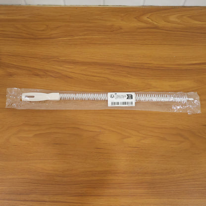 Flexible drain cleaning brush in kitchen setting