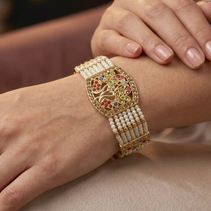 Gold-tone bridal bracelet with floral pearl and stone design