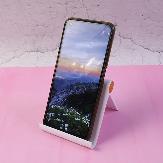 White plastic foldable desktop mobile stand