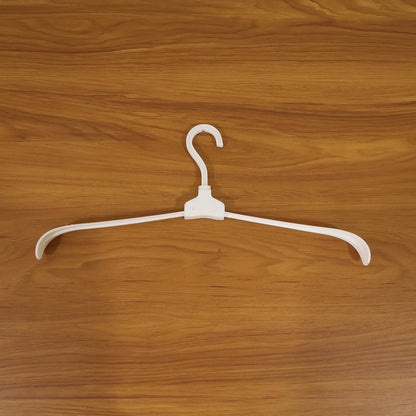 Plastic foldable garment hanger in use
