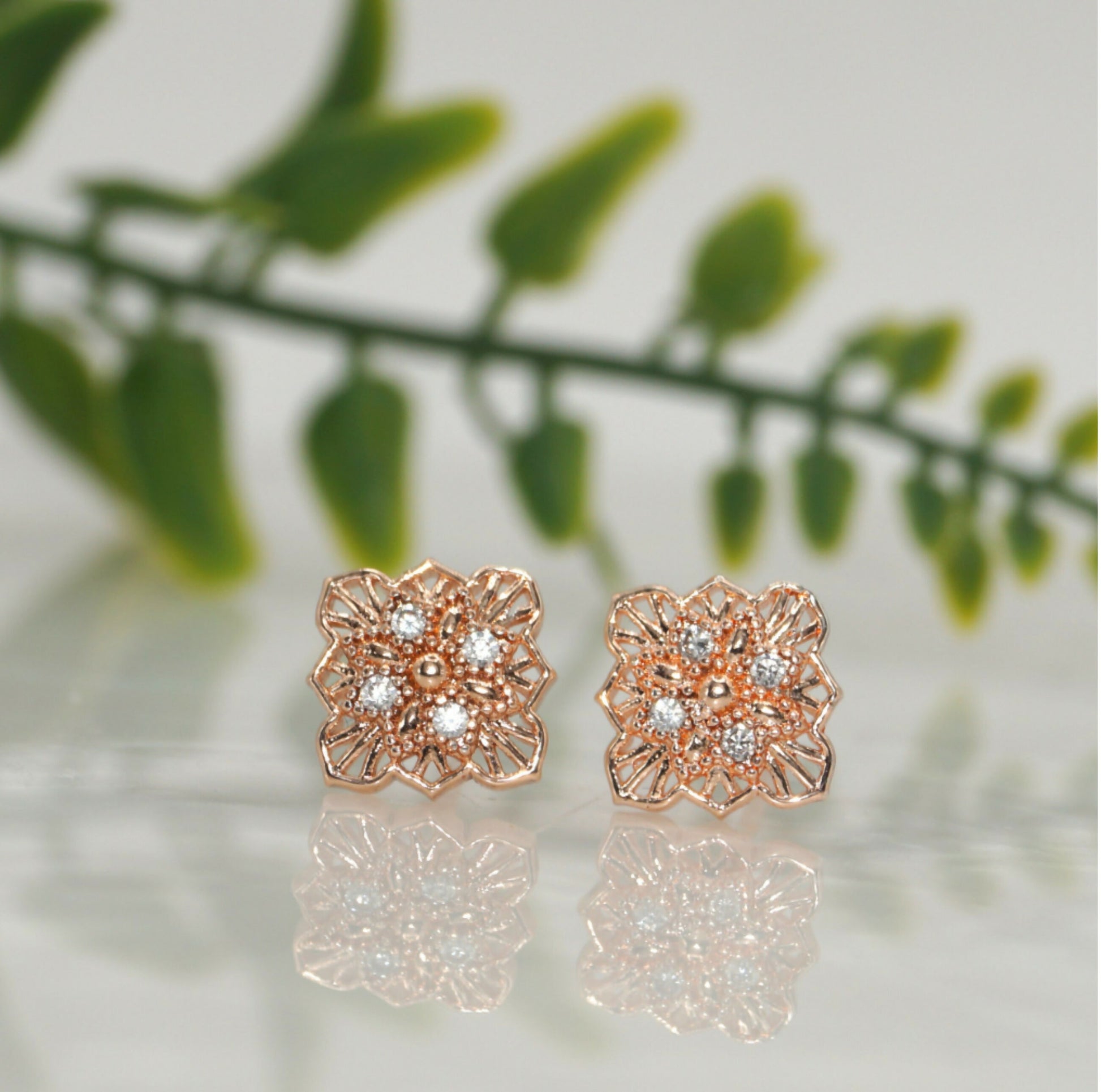 Rose Gold Filigree Square Stud Earrings showing intricate vintage lace design