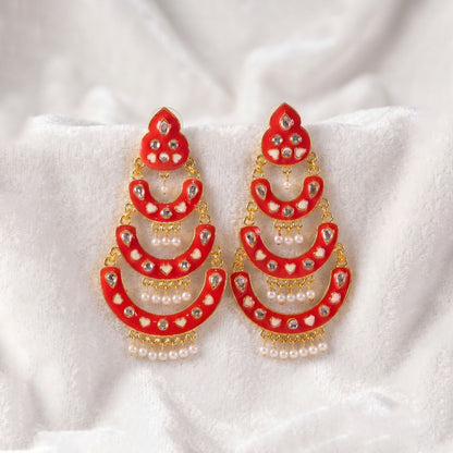 Full view of layered Chandbali earrings with heart-style accents