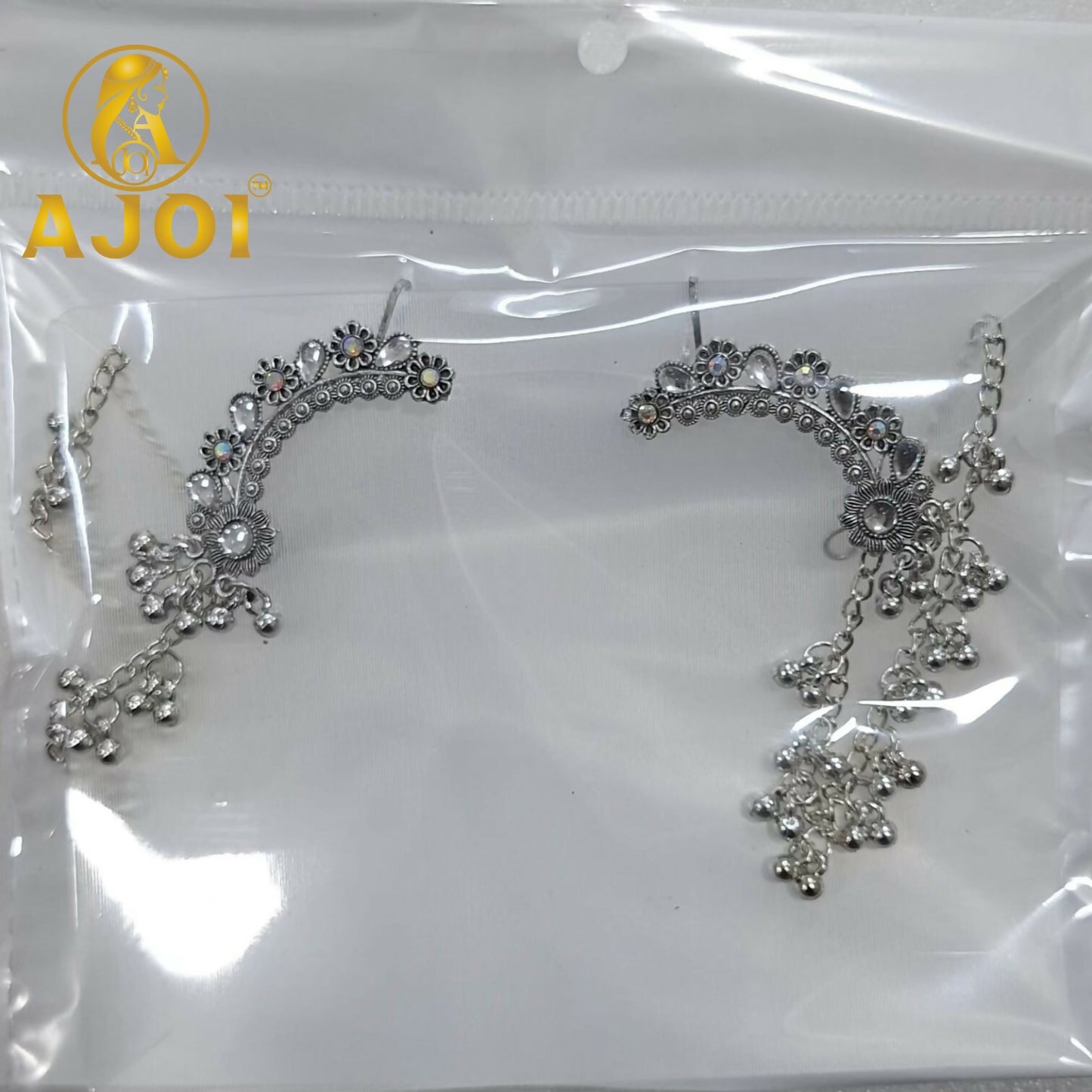 Vintage silver ear cuff jhumka earrings highlighting antique finish and ghungroo drops
