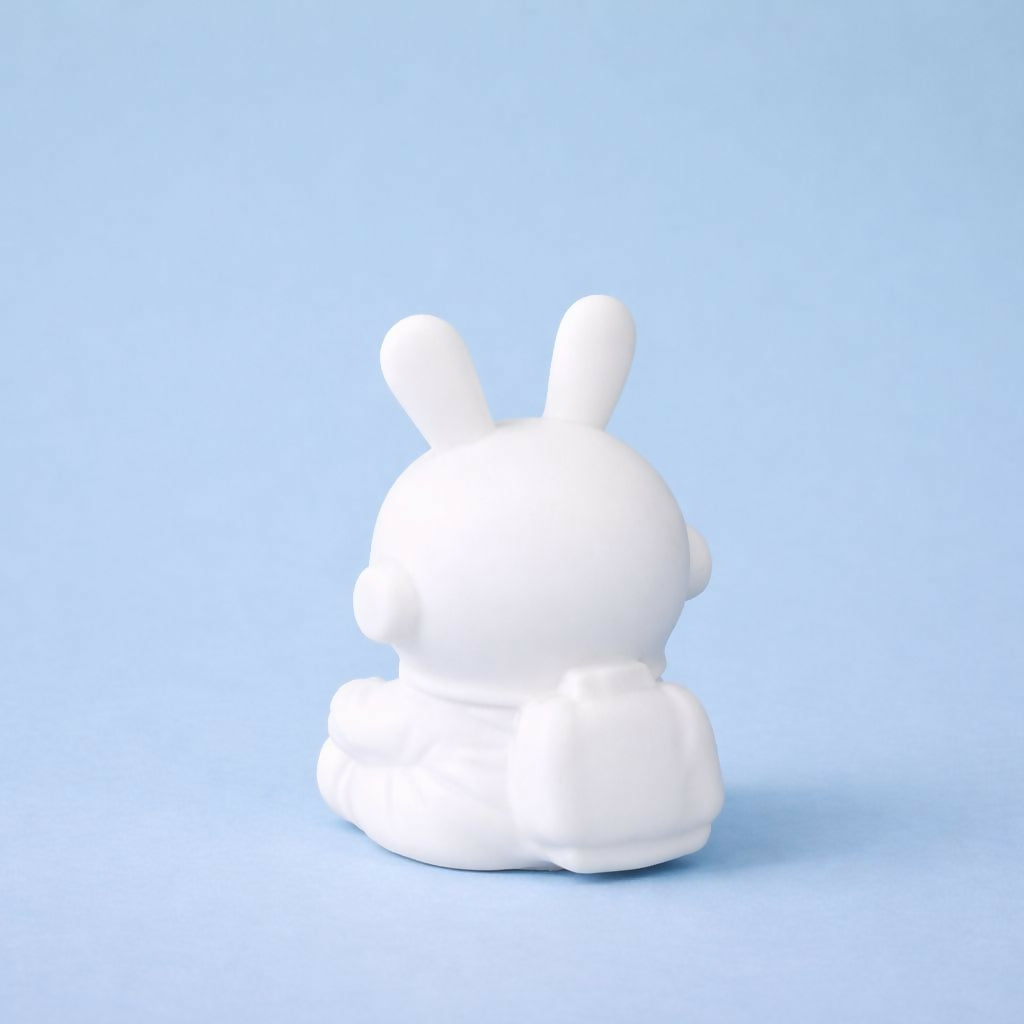 Side view of silver bunny astronaut LED night lamp