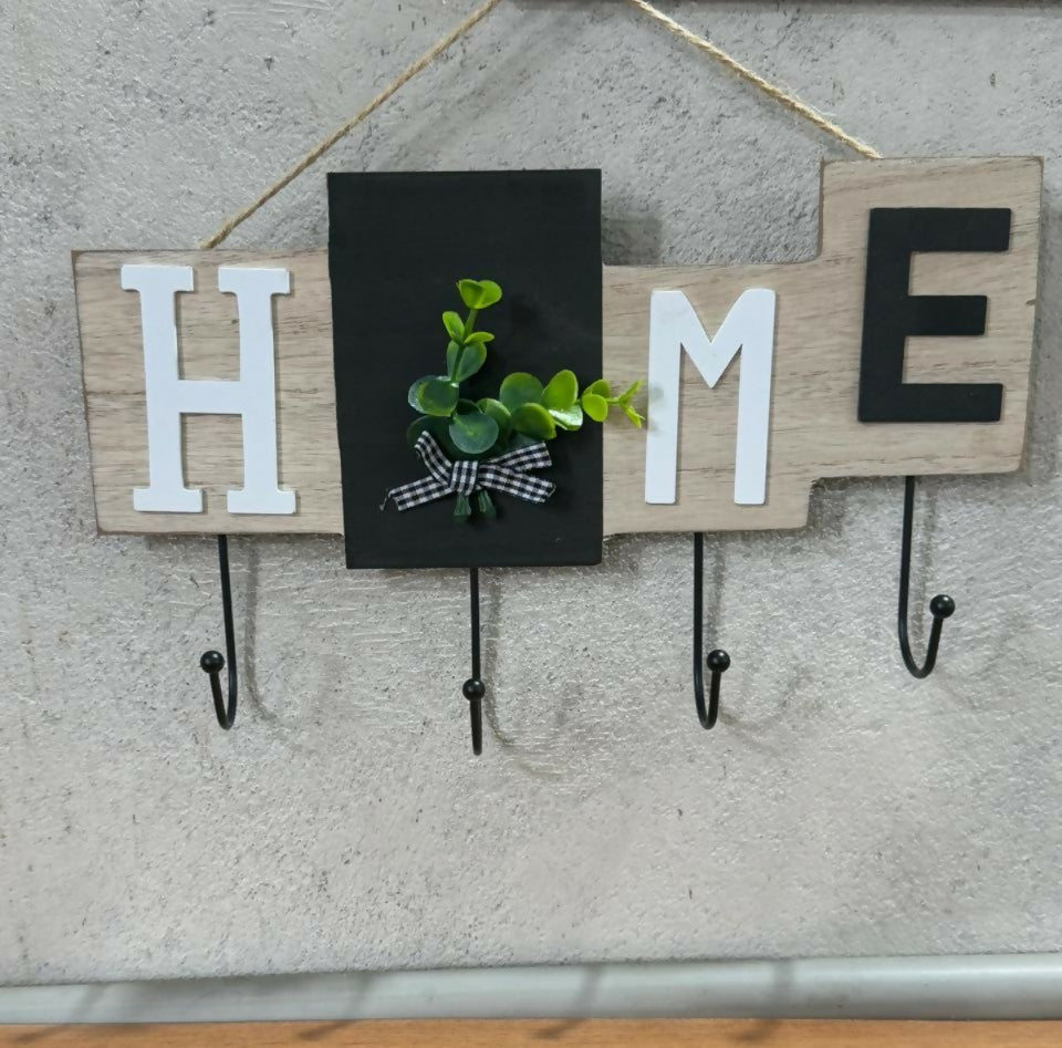 Wooden Wall Mounted Key Holder with Hooks – Decorative “HOME” Letter Design with Artificial Green Leaf Accent and Bow, Rustic Entryway Organizer for Keys, Wallets & Accessories
