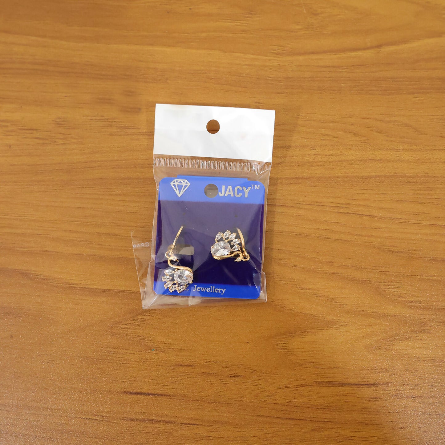 Elegant swan drop earrings complementing traditional and modern outfits