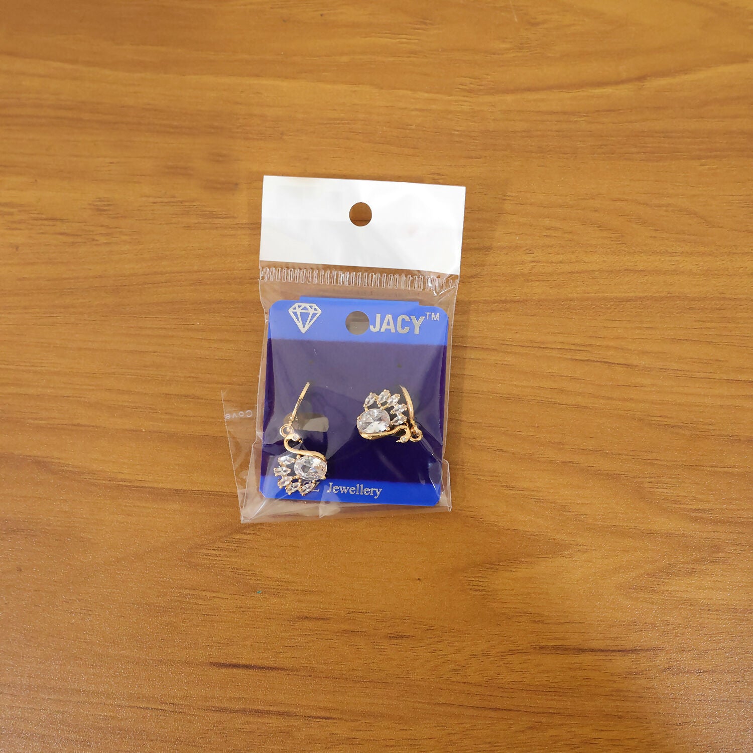 Elegant swan drop earrings complementing traditional and modern outfits