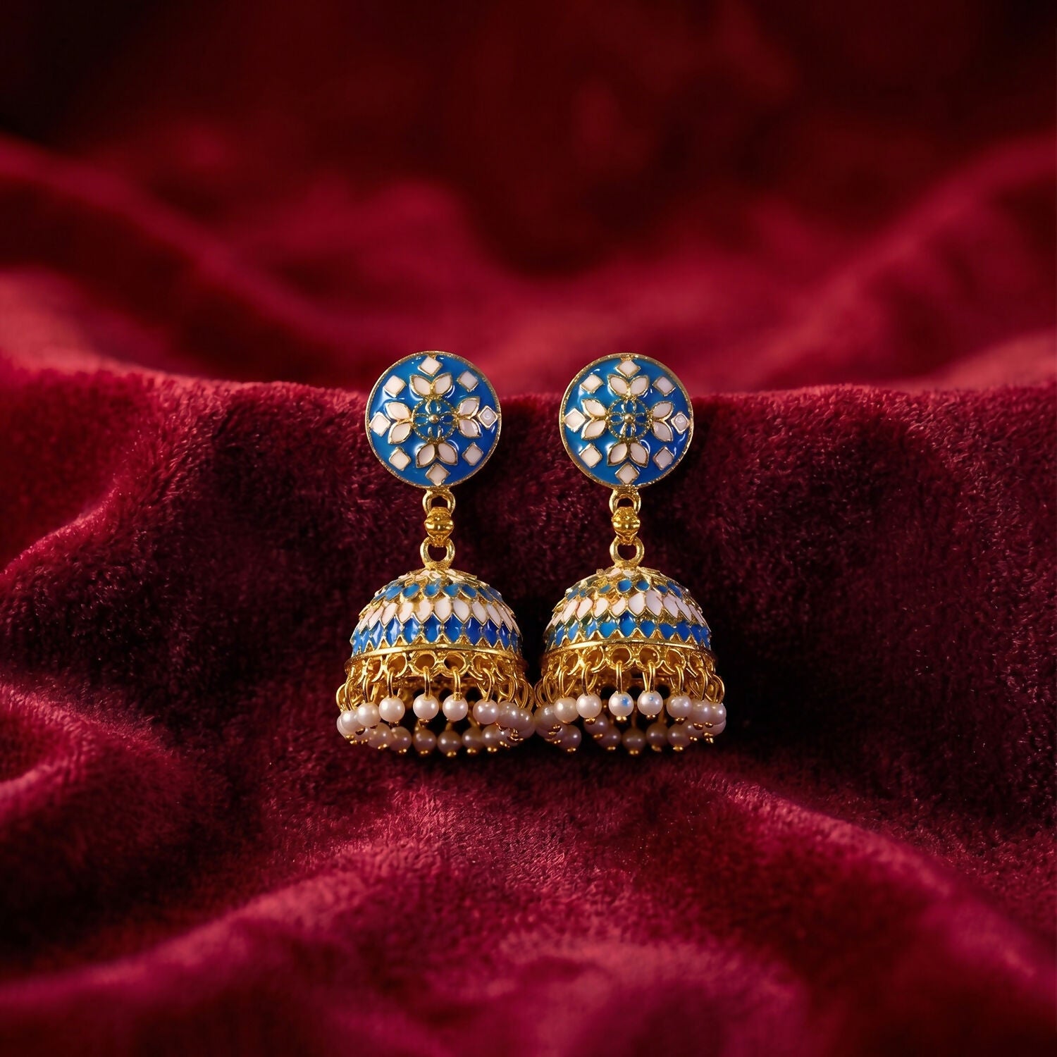 Blue round stud jhumka earrings with pearl hangings, detailed view