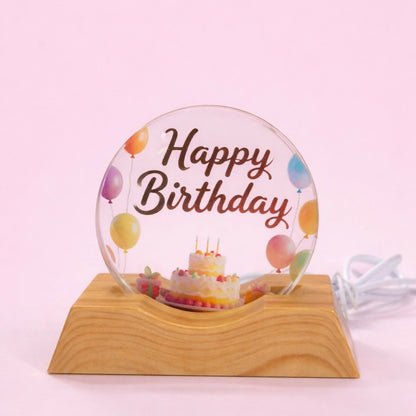 Side view of LED Happy Birthday night lamp on wooden stand