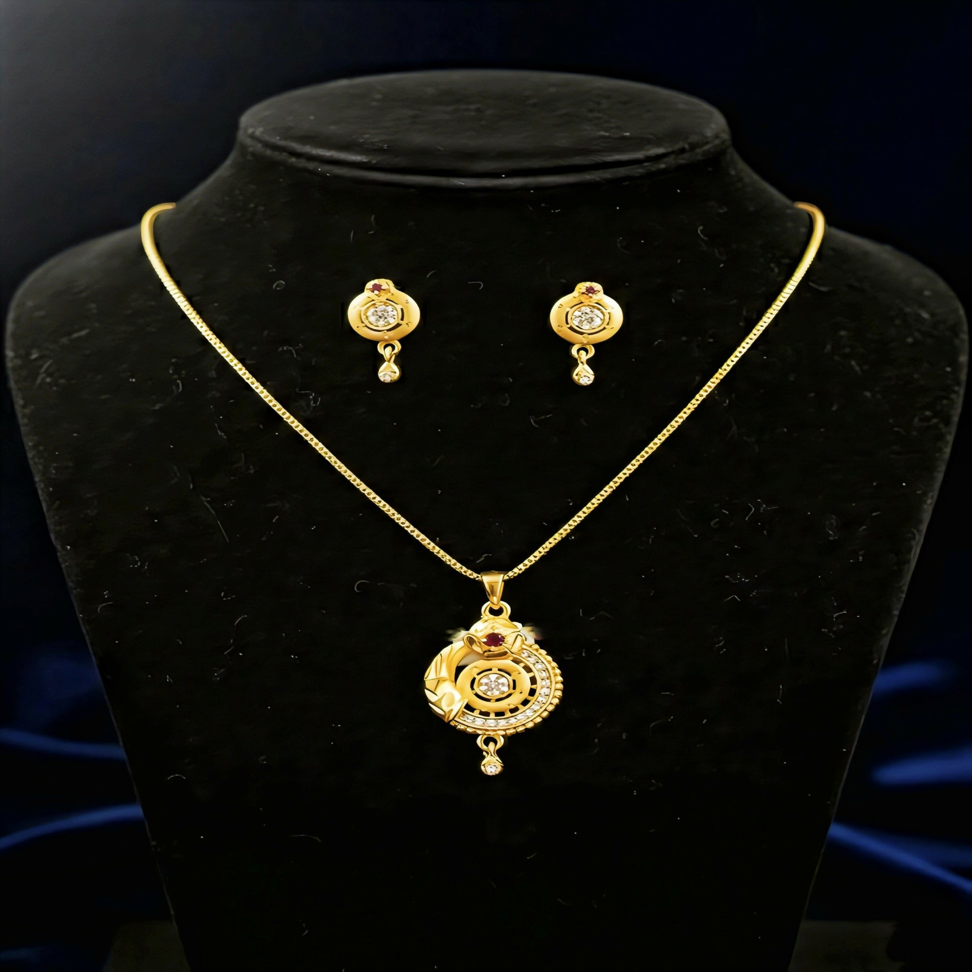 Gold-Plated Circular Pendant Necklace with Matching Drop Earrings – Floral Diamond & Ruby Accents