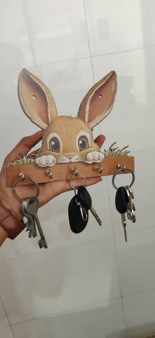 Decorative bunny key rack in a home entryway