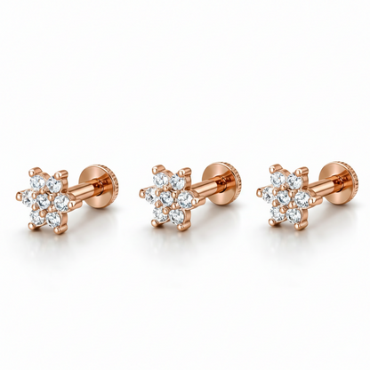 Flat-back labret post on rose gold crystal flower nose piercing for comfort