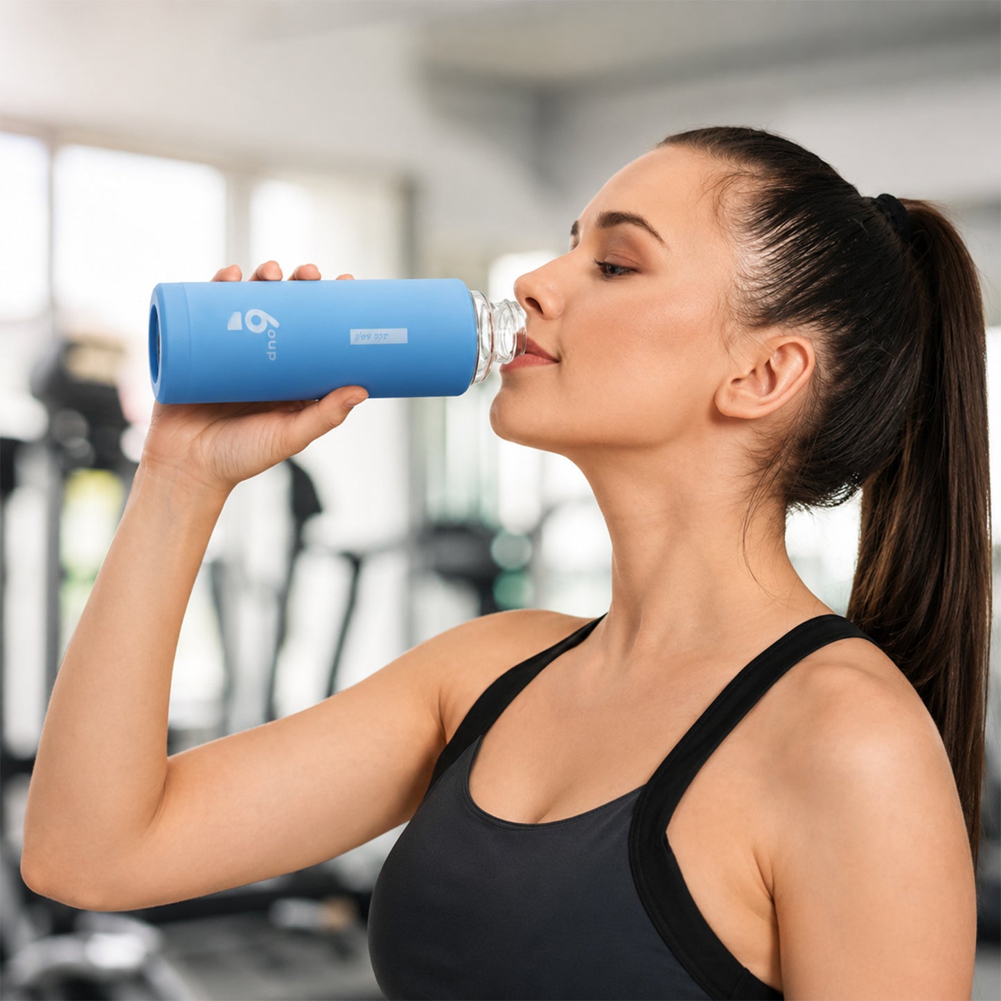 Reusable glass drinking bottle