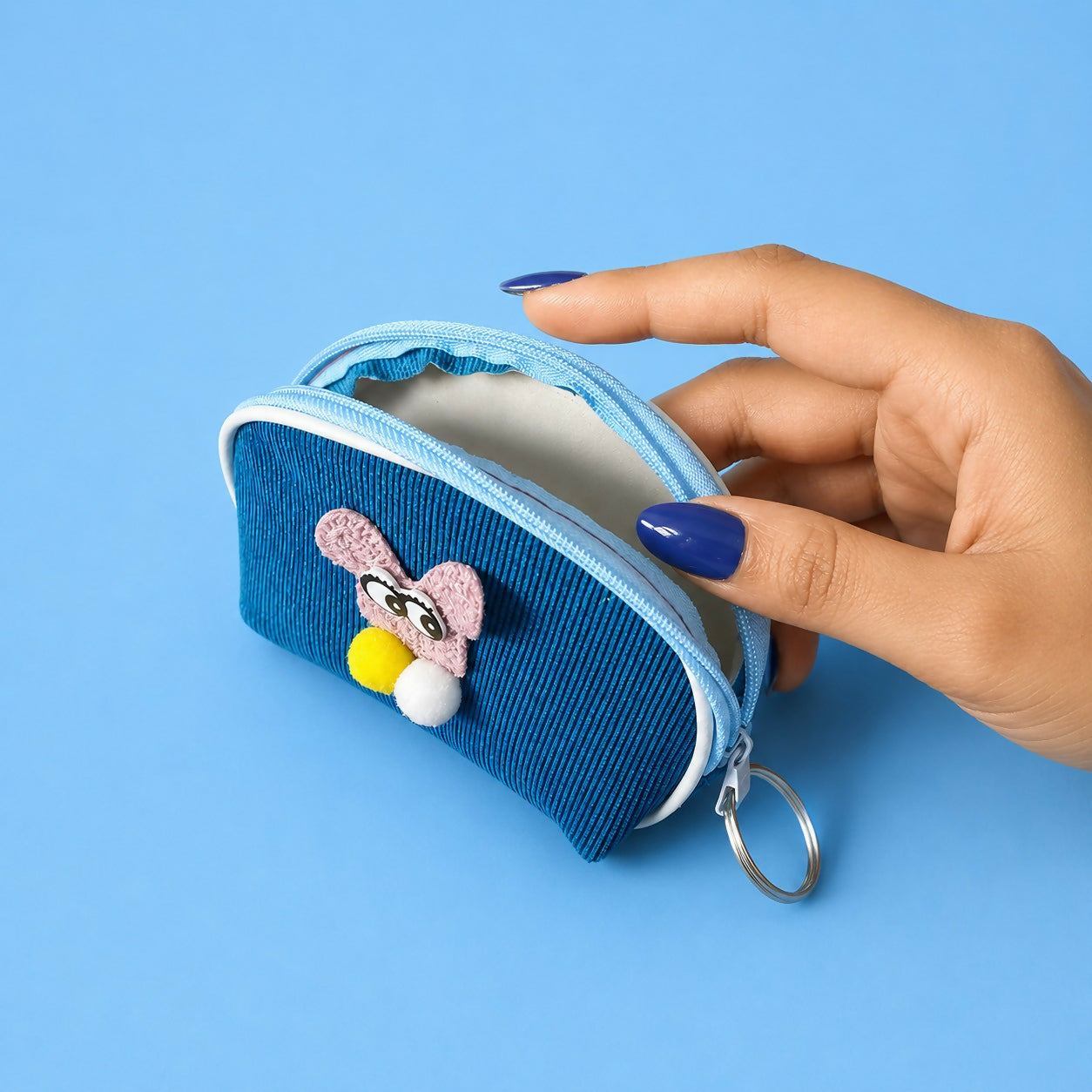 Close-up of cute bunny design coin pouch with zipper