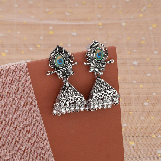 Oxidised silver Krishna jhumka earrings with flute and peacock feather design