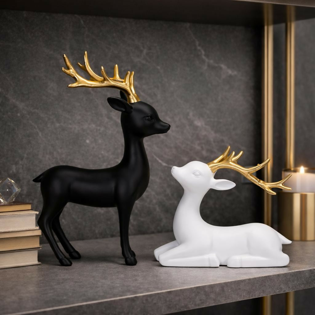 Black and white deer showpiece set with golden antlers - standing and resting figurines