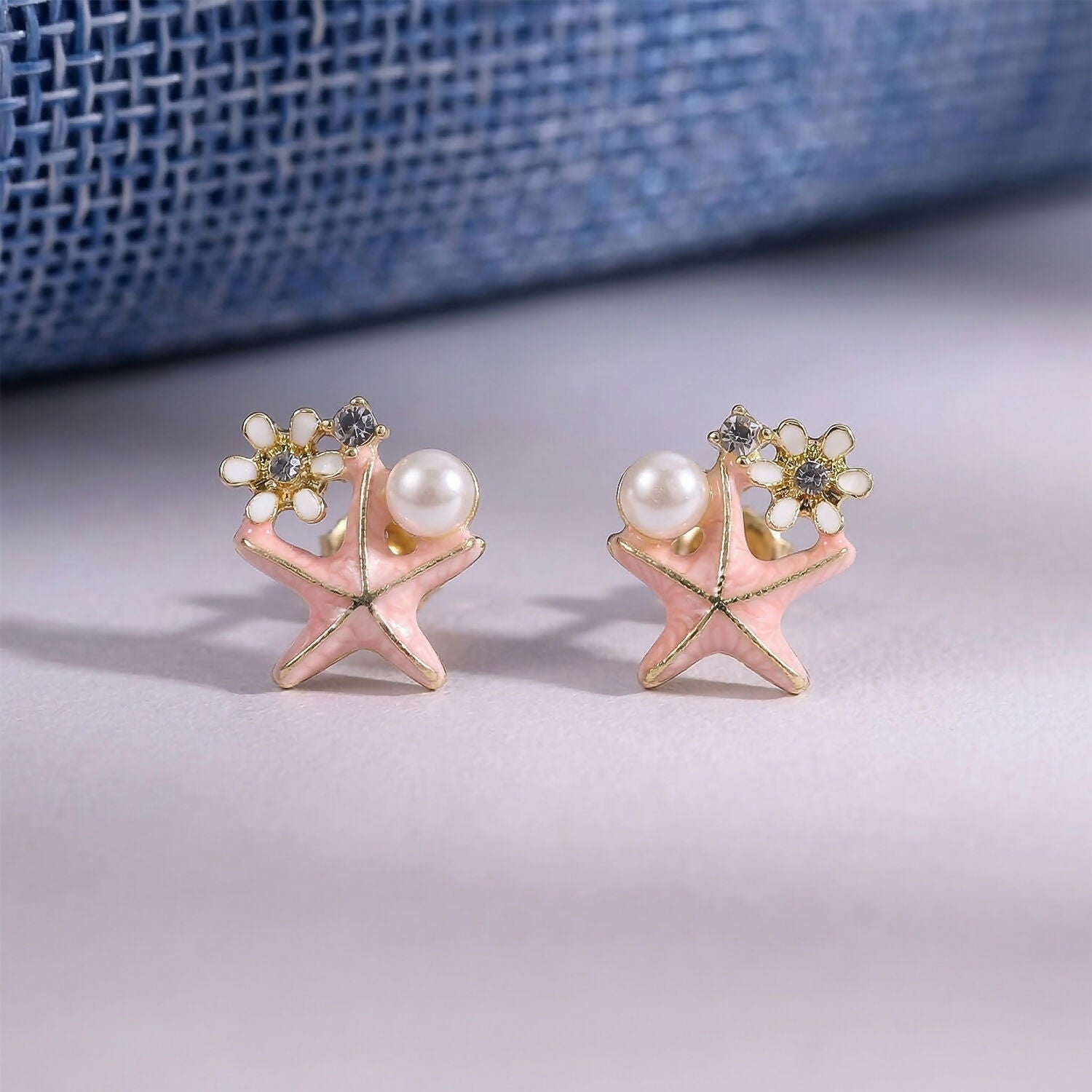 Elegant lightweight pink starfish pearl stud earrings