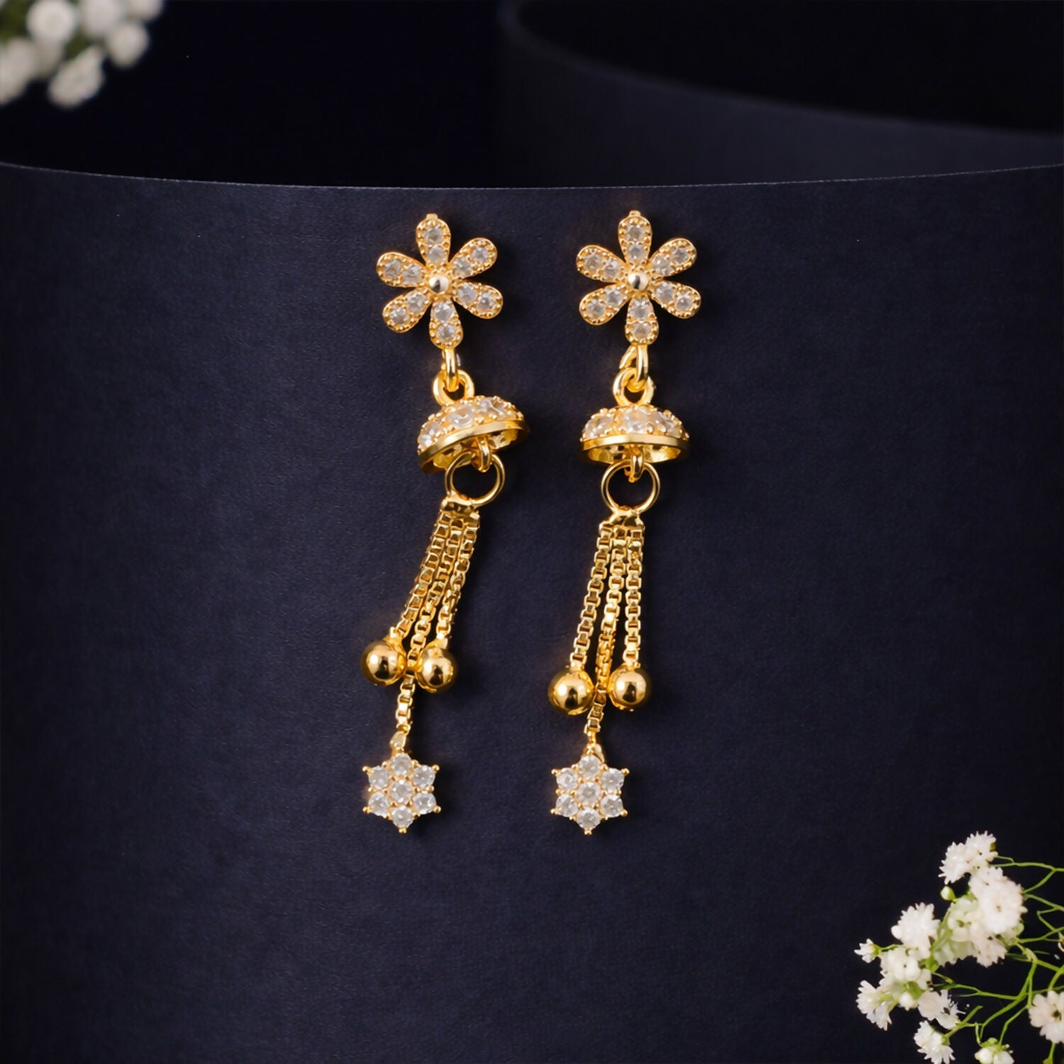 Rose gold geometric stud with dangling floral starburst earrings