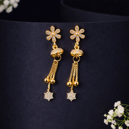 Rose gold geometric stud with dangling floral starburst earrings