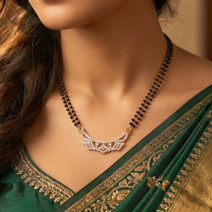 Elegant traditional mangalsutra featuring openwork floral pendant in rose gold finish