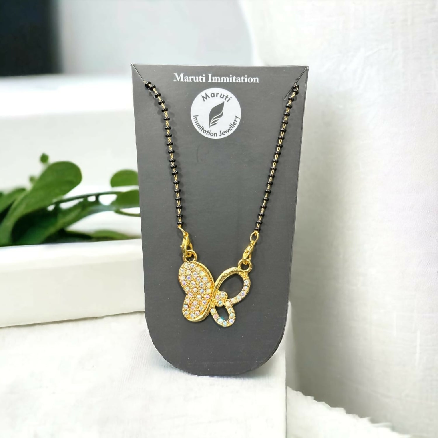 Elegant Gold-Toned Butterfly Design Mangalsutra with Sparkling Stone Pendant