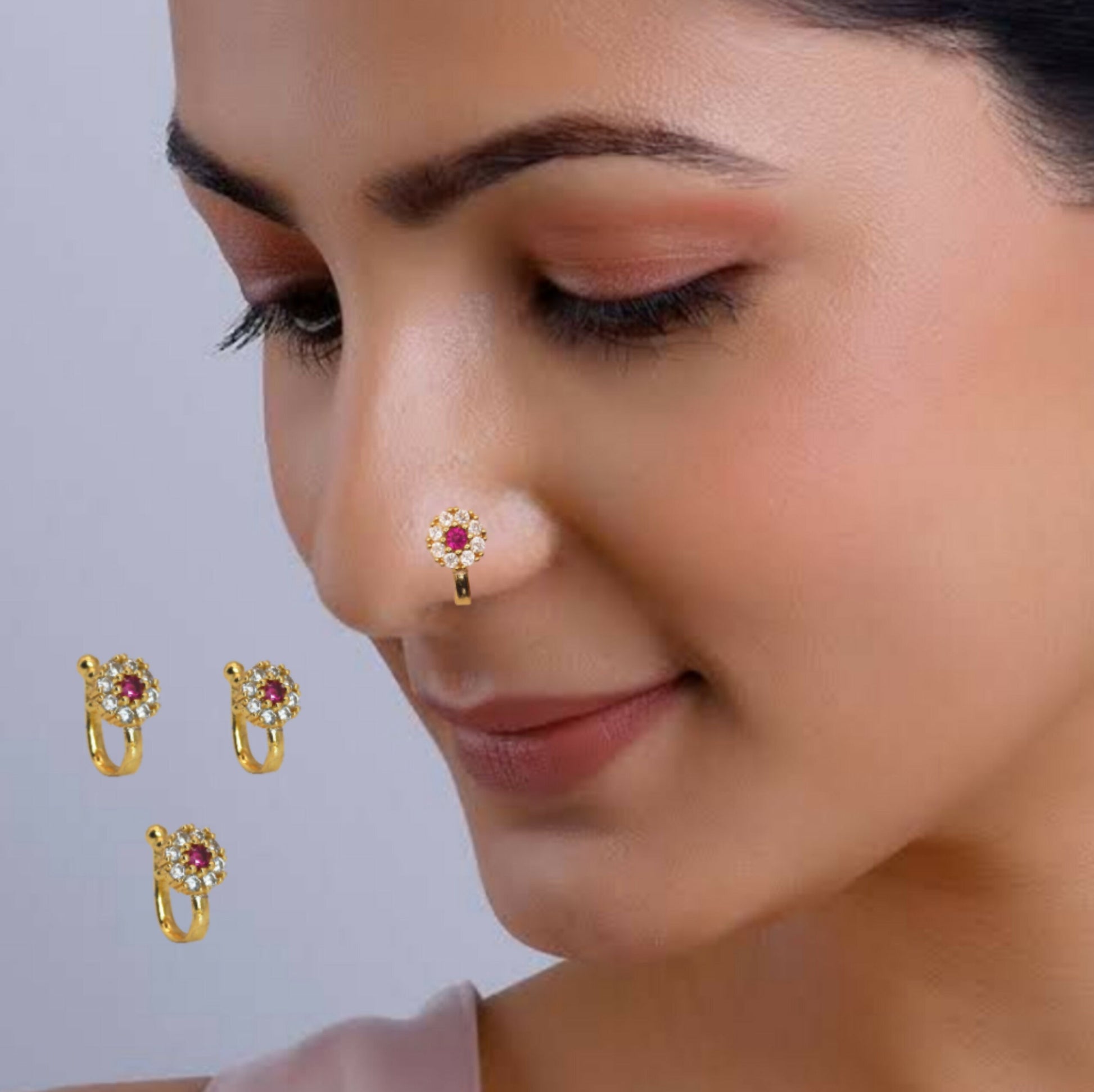 Gold plated floral clip-on nose ring with red center and white stones enhancing elegance
