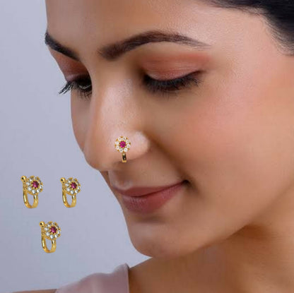 Gold plated floral clip-on nose ring with red center and white stones enhancing elegance