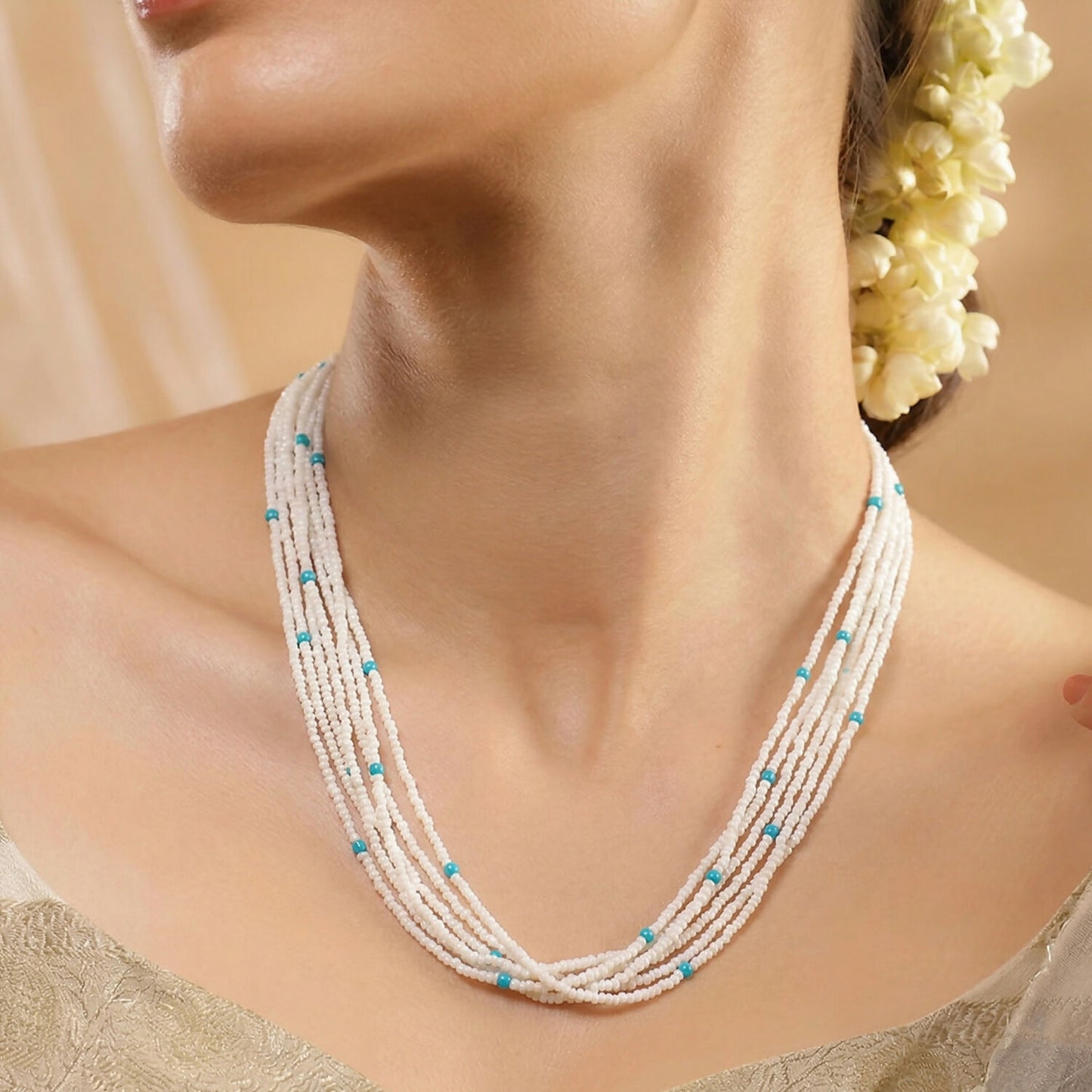 Elegant pearl mala necklace styled with traditional Indian attire