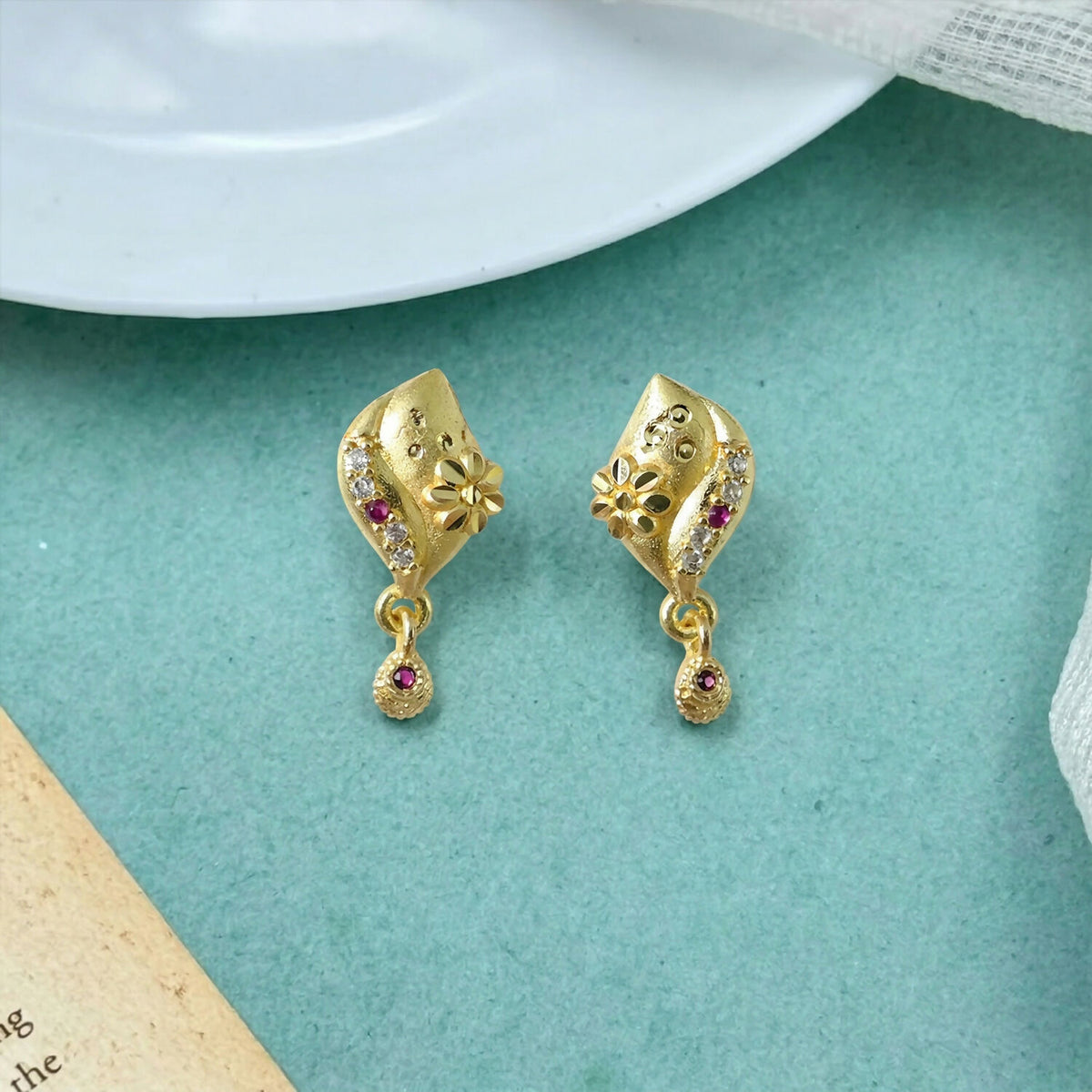 Fashionable gold plated flower earrings, perfect for modern and ethnic looks