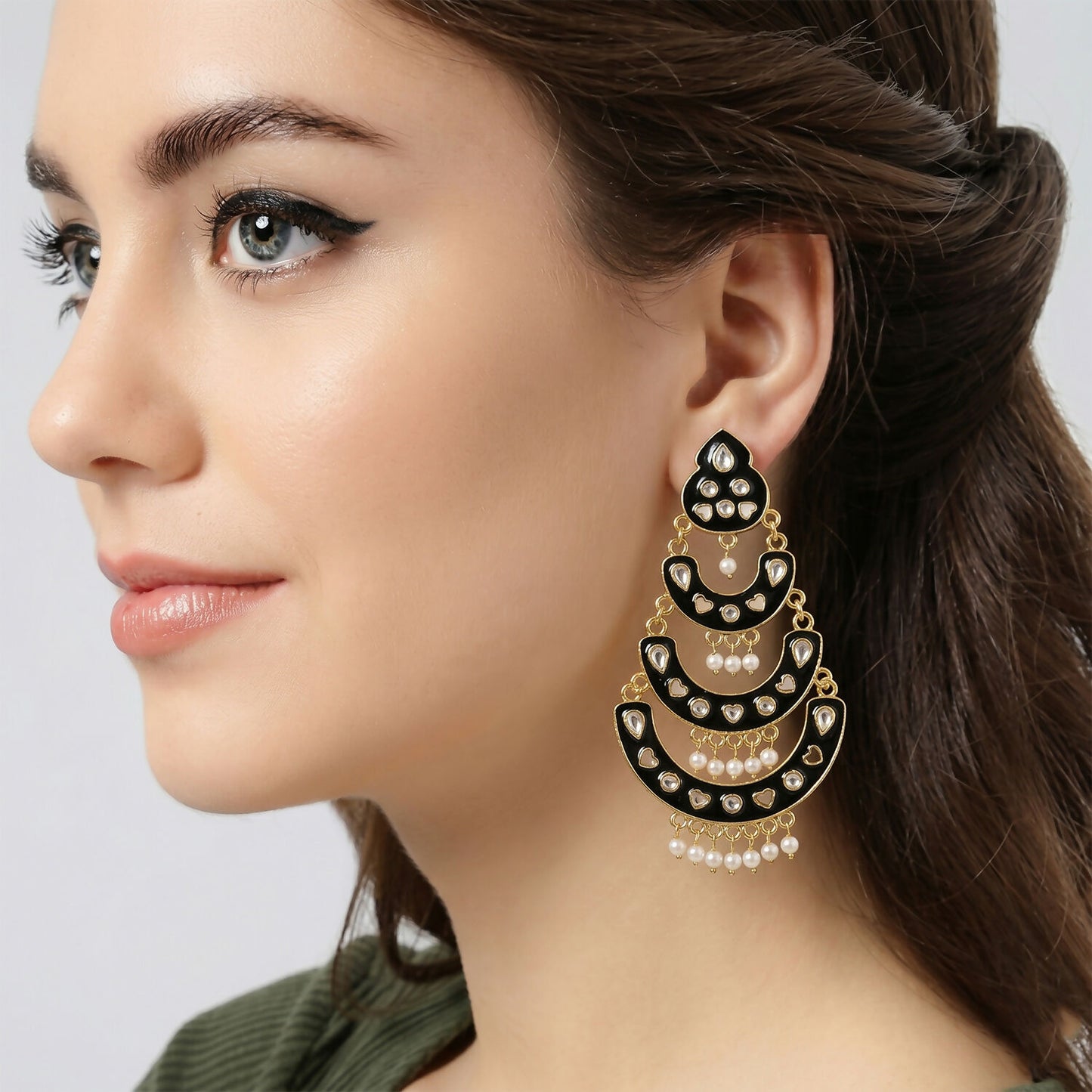 Close-up of decorative stone-style accents on chandbali earrings