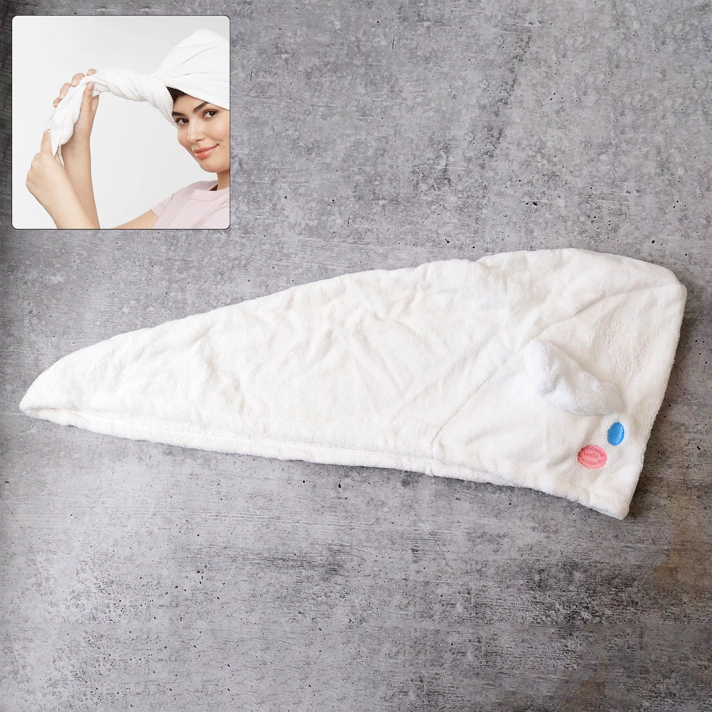 Close-up of microfiber hair towel wrap with button for secure fit, soft and absorbent material