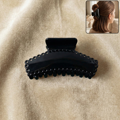 Elegant black hair claw clip holding hair securely